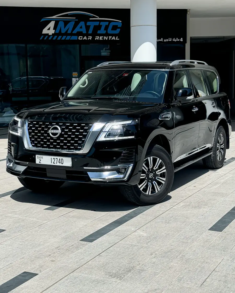 Rent Nissan Patrol Platinum Black 2023 in Dubai — photo 1 of 3