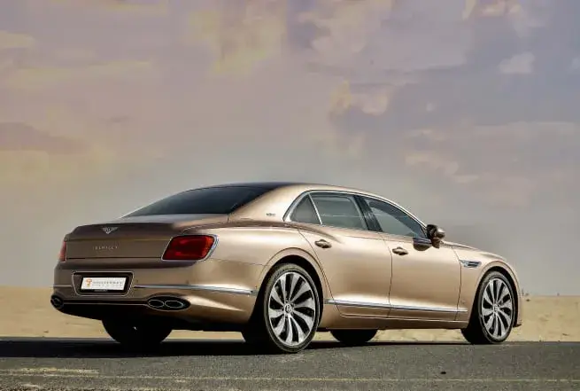 Rent Bentley Flying Spur Gold in Dubai — photo 3 of 5