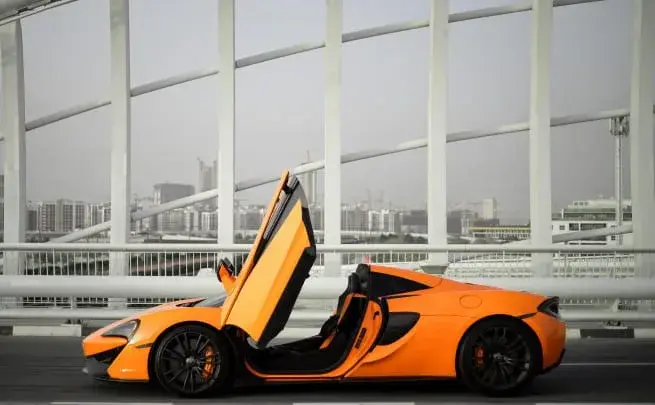 Rent Mclaren 570S Spider Orange in Dubai — photo 2 of 5