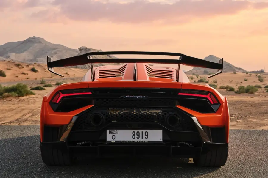 Rent Lamborghini Huracan STO Orange in Dubai — photo 3 of 5