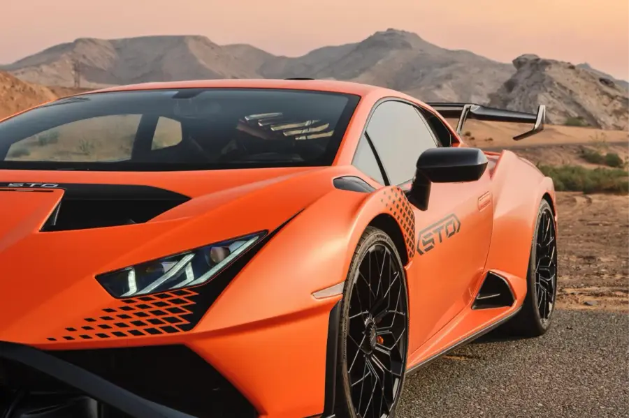 Rent Lamborghini Huracan STO Orange in Dubai — photo 4 of 5