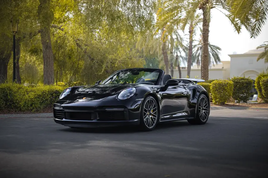 Rent Porsche 911 Turbo S Black in Dubai — photo 2 of 7