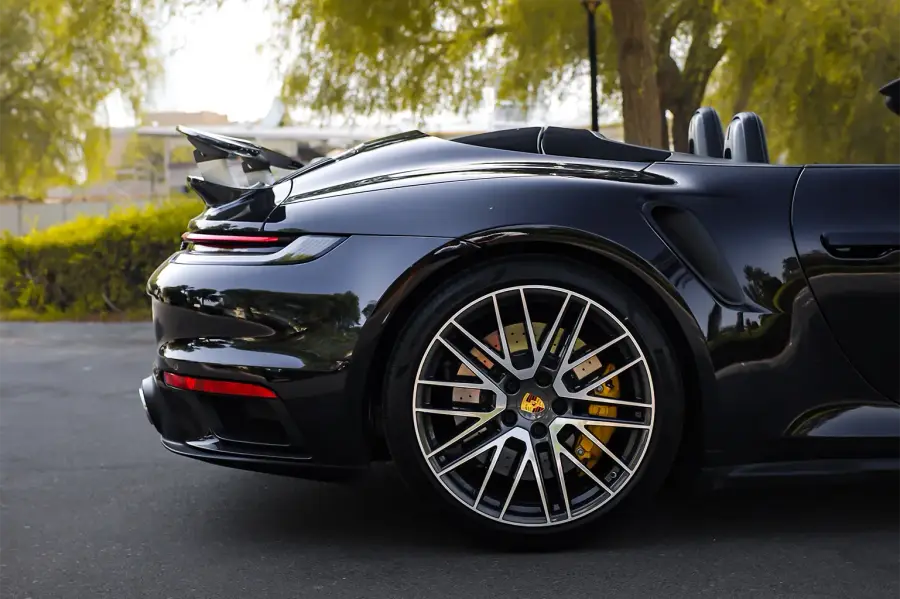 Rent Porsche 911 Turbo S Black in Dubai — photo 4 of 7